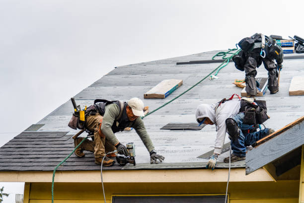 Professional Gutter Installation technician working in Madera, CA